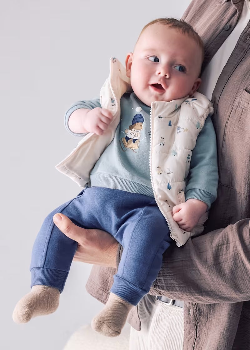Baby boy wearing the Mayoral 3 piece gilet tracksuit set with blue sweatshirt and navy trousers