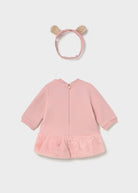 Rear view of the Mayoral baby girls pink long-sleeved dress with ruffle hem and matching headband