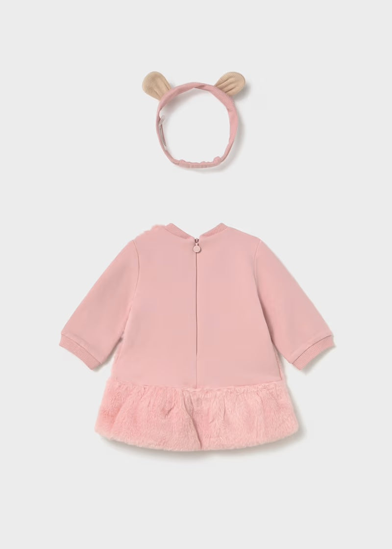 Rear view of the Mayoral baby girls pink long-sleeved dress with ruffle hem and matching headband