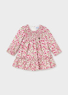Mayoral baby girls pink floral velvet dress front view with smocked bodice and ruffle hem