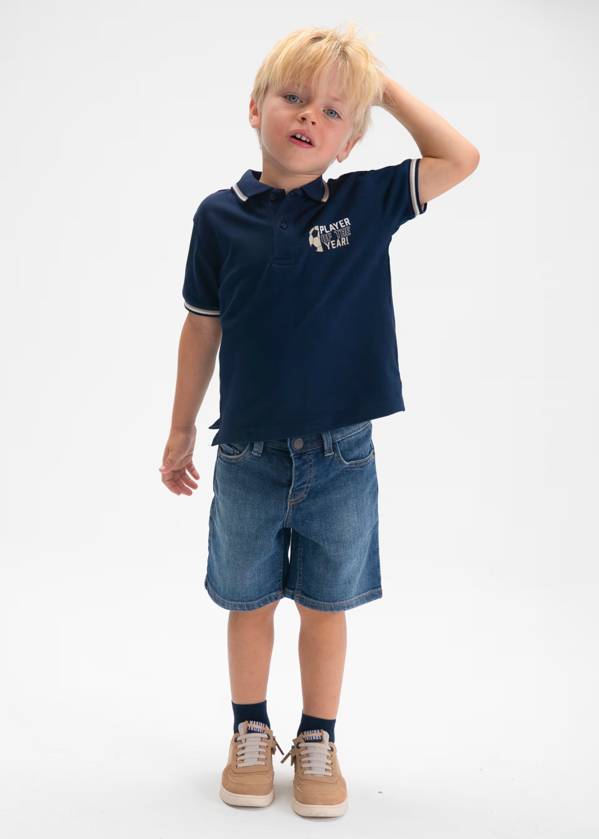 Mayoral boys smart navy polo shirt 2
With graphic print worn on model aged 7 years 