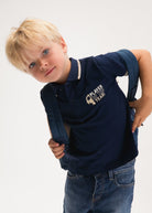 Mayoral boys navy polo top worn on boy aged 8 years old.