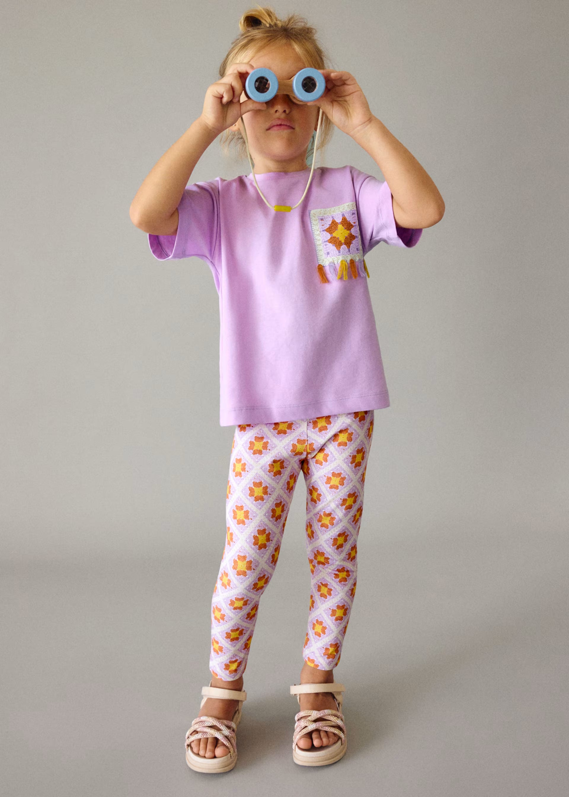 Mayoral girls lilac top and printed leggings set worn on model