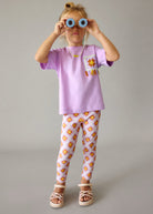 Mayoral girls lilac top and printed leggings set worn on model