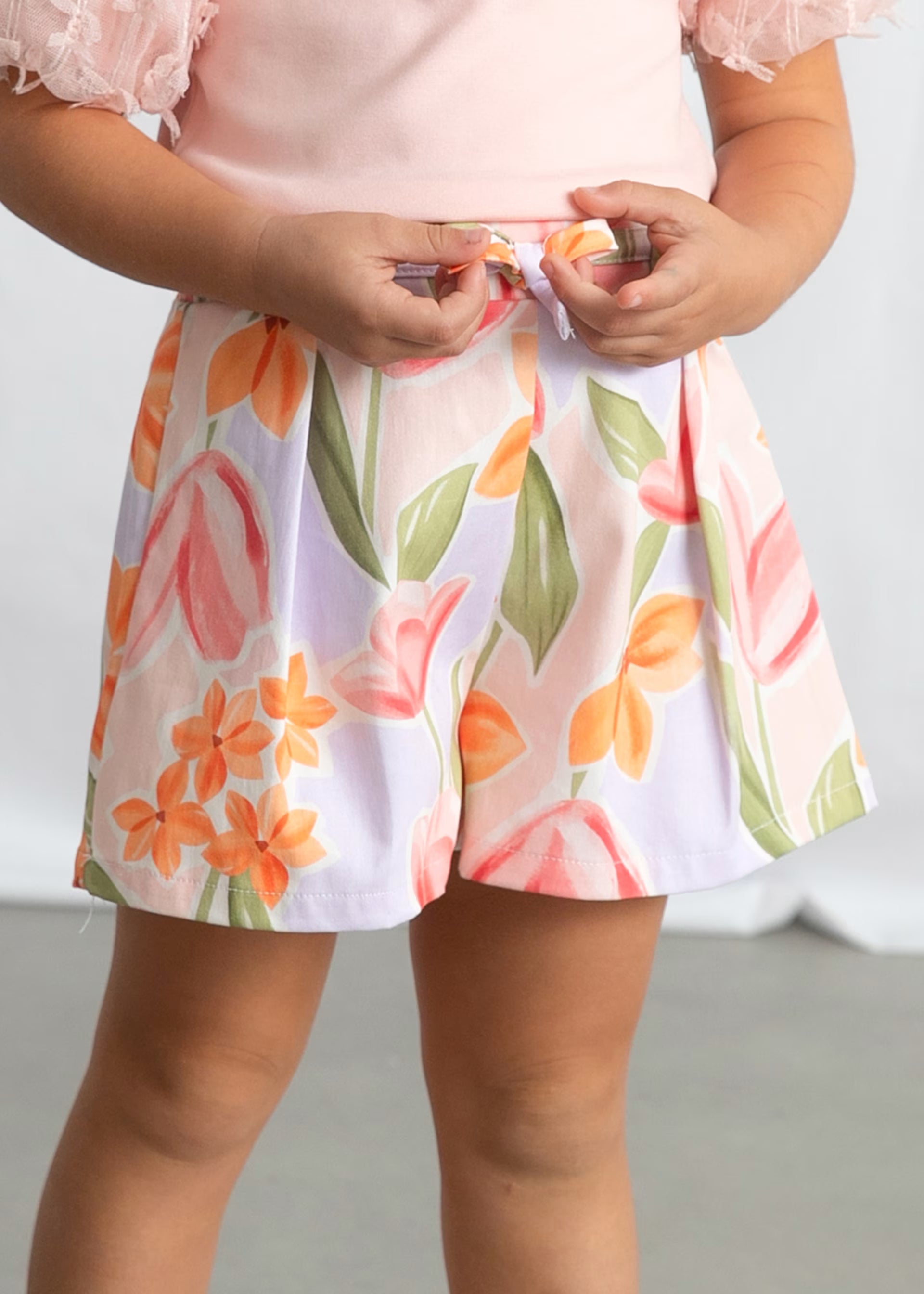 Mayoral girls floral shorts styled with pink top