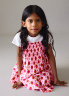 Mayoral girls pink patterned dress on girl aged 6