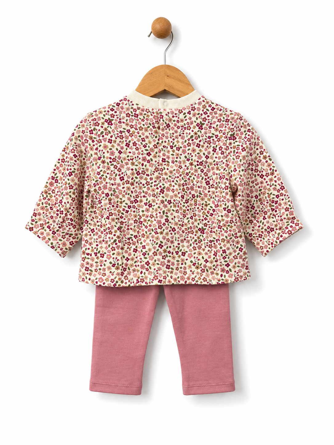 Rear view of Mayoral baby girls pink sweatshirt and floral leggings showing the back popper fastening