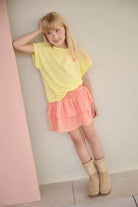 NoNo girls coral skirt worn with yellow top outfit