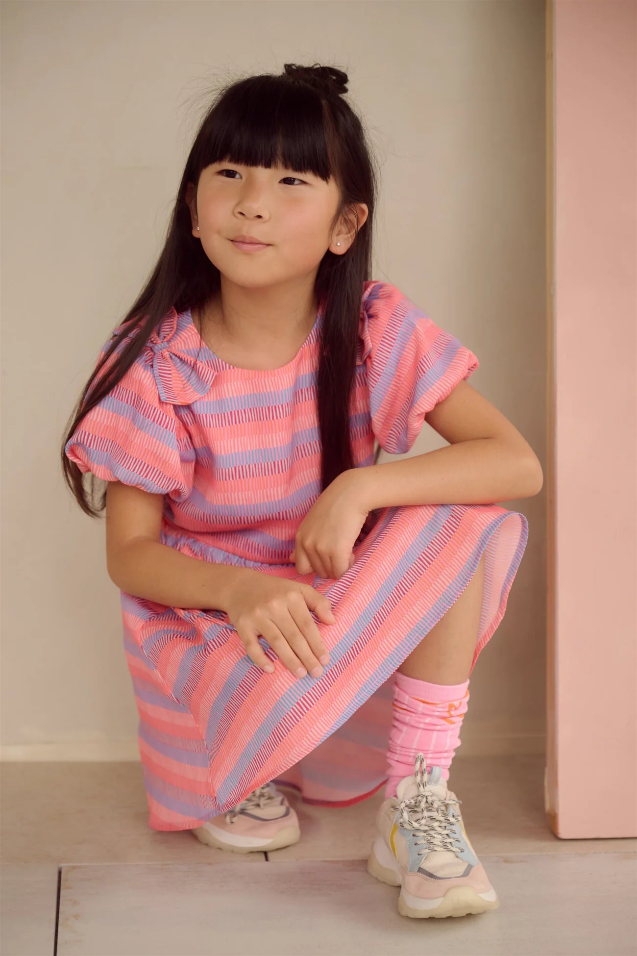 NoNo girls striped occasion dress worn with short sleeves and gathered skirt