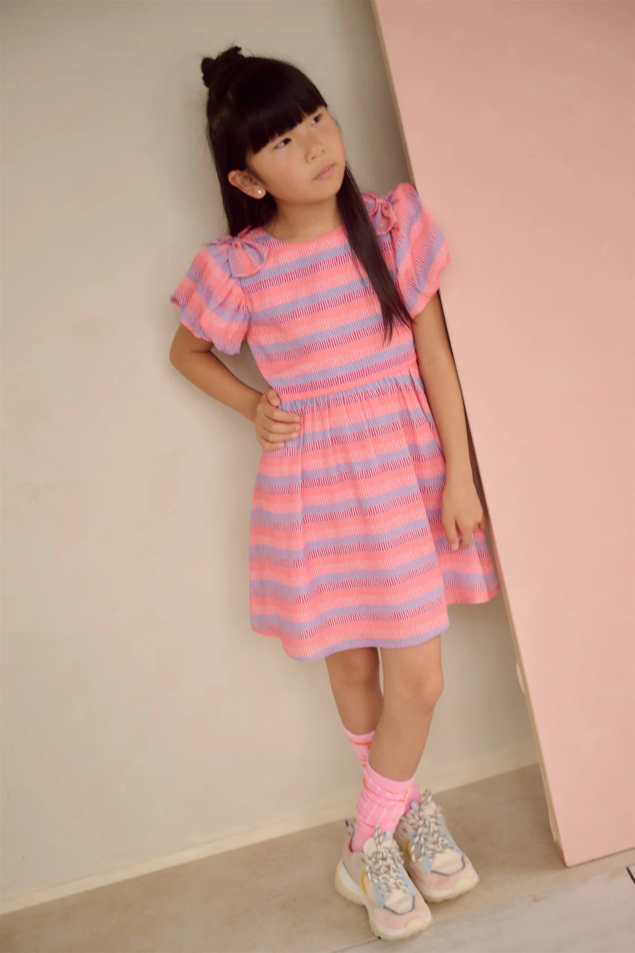 NoNo girls pink and coral stripe dress full length on model