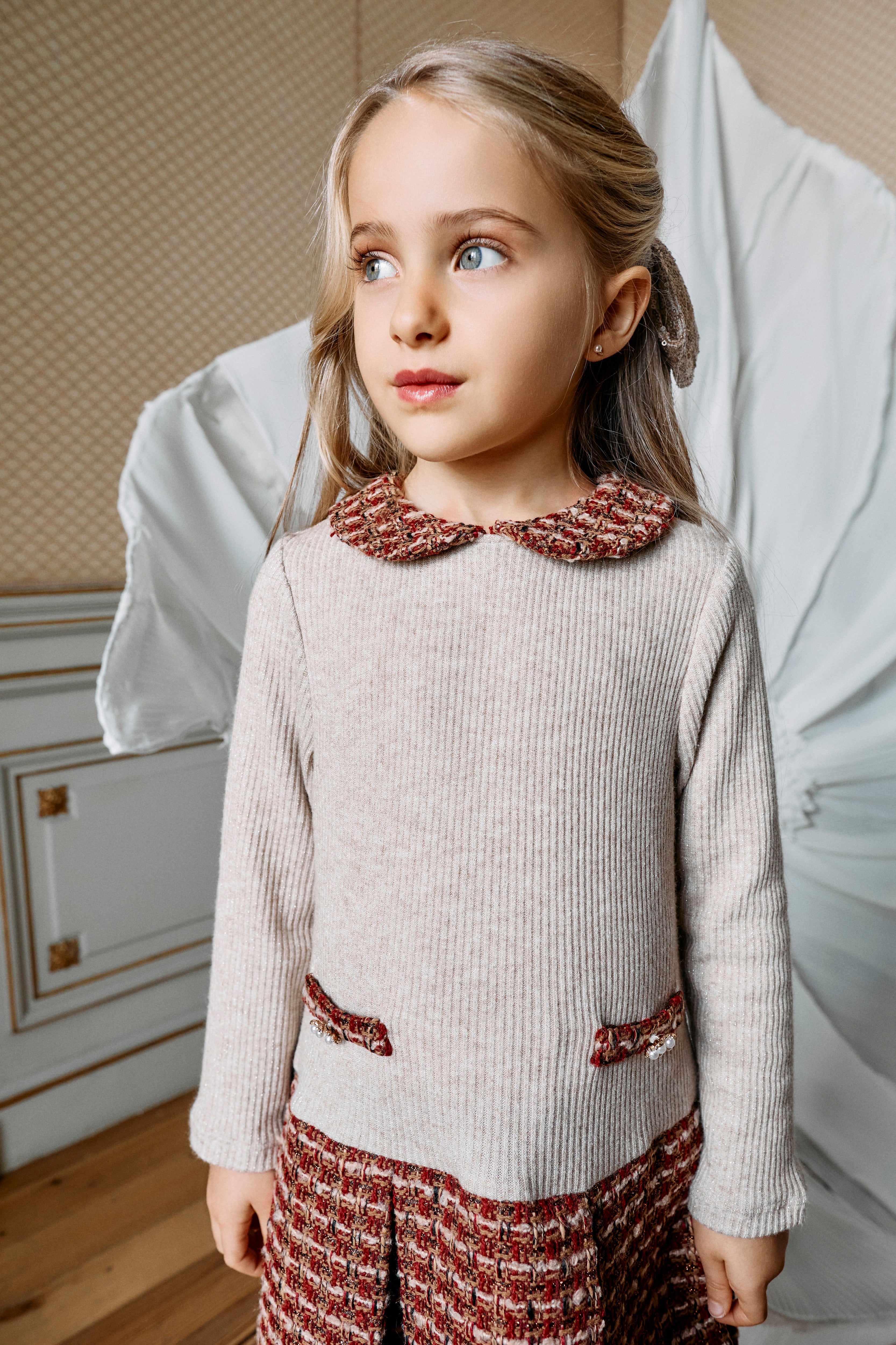 Girl wearing Patachou burgundy tweed dress with Peter Pan collar