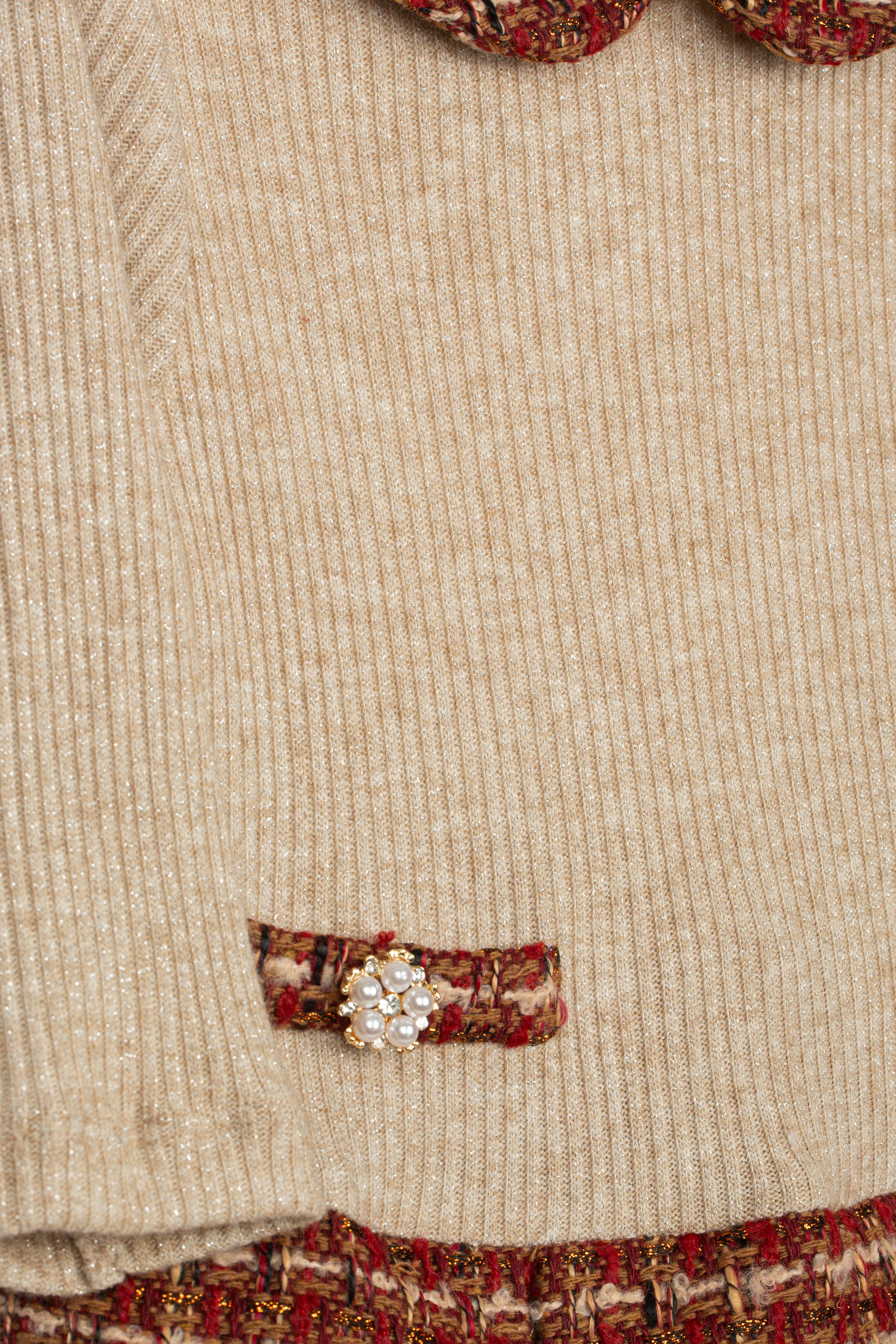 Close-up of Patachou tweed dress pocket with jewel button detail