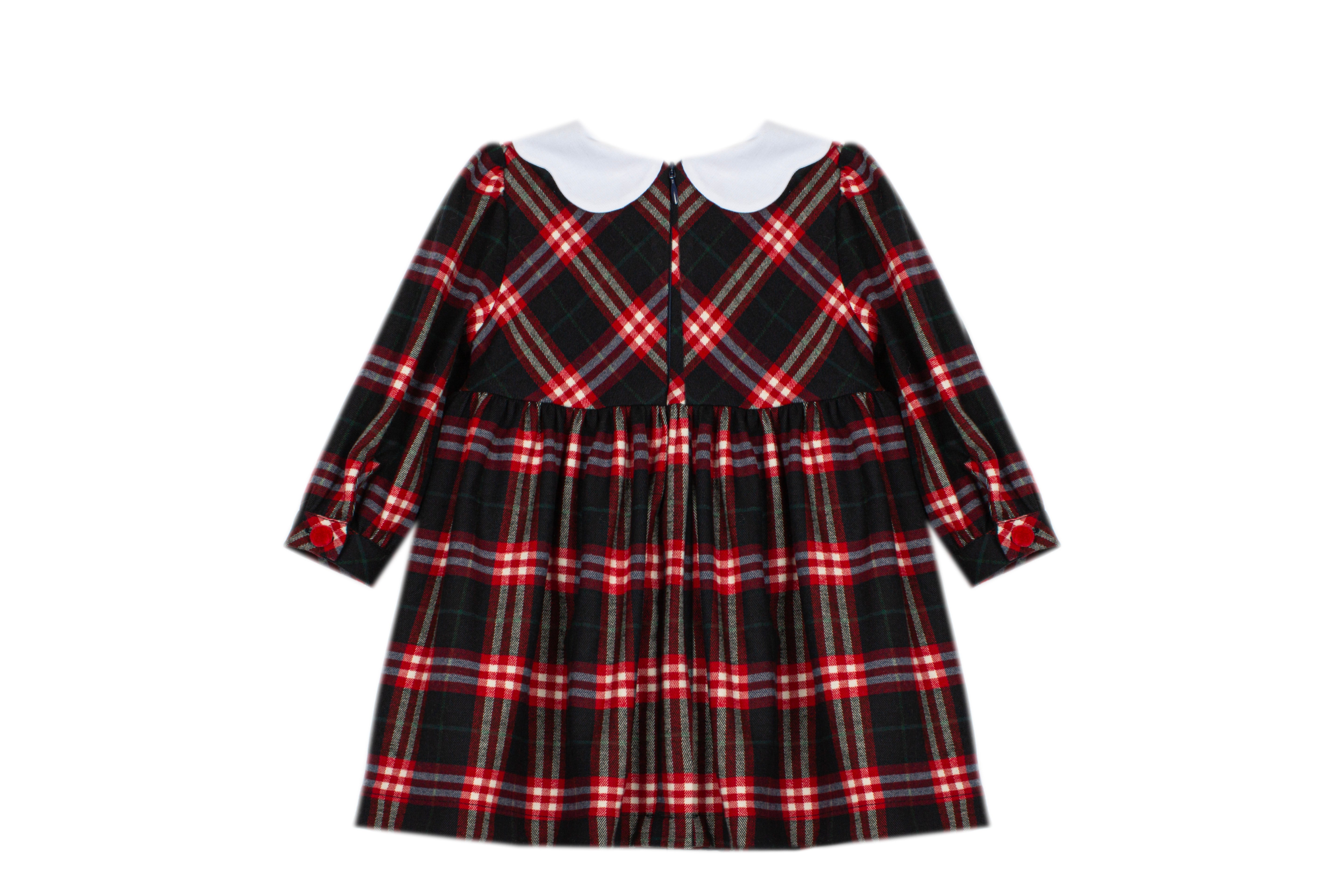     Girl wearing Patachou Balmoral red and navy tartan smocked dress Back view 