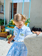 Patachou girls blue striped lemon skirt and top set at an worn outdoor occasion 