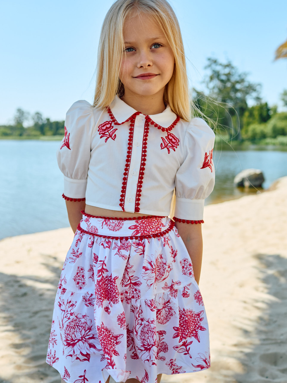 Patachou girls red floral skirt and top set worn outdoor