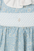 Close-up of Patachou blue garden dress smocked chest panel
