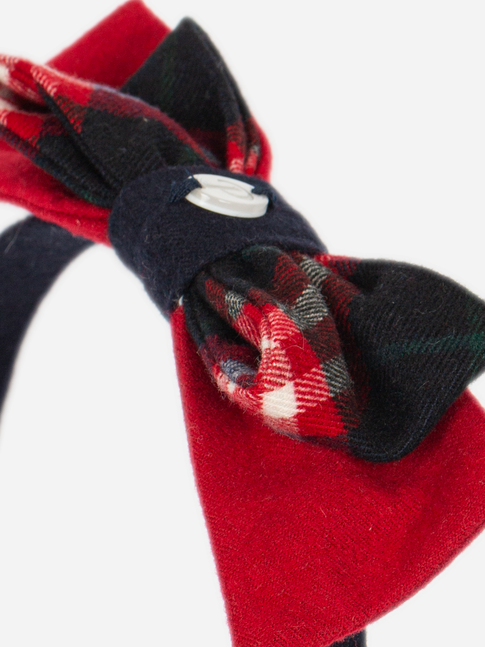 Close-up of Patachou Marine hairband red and navy tartan bow detail