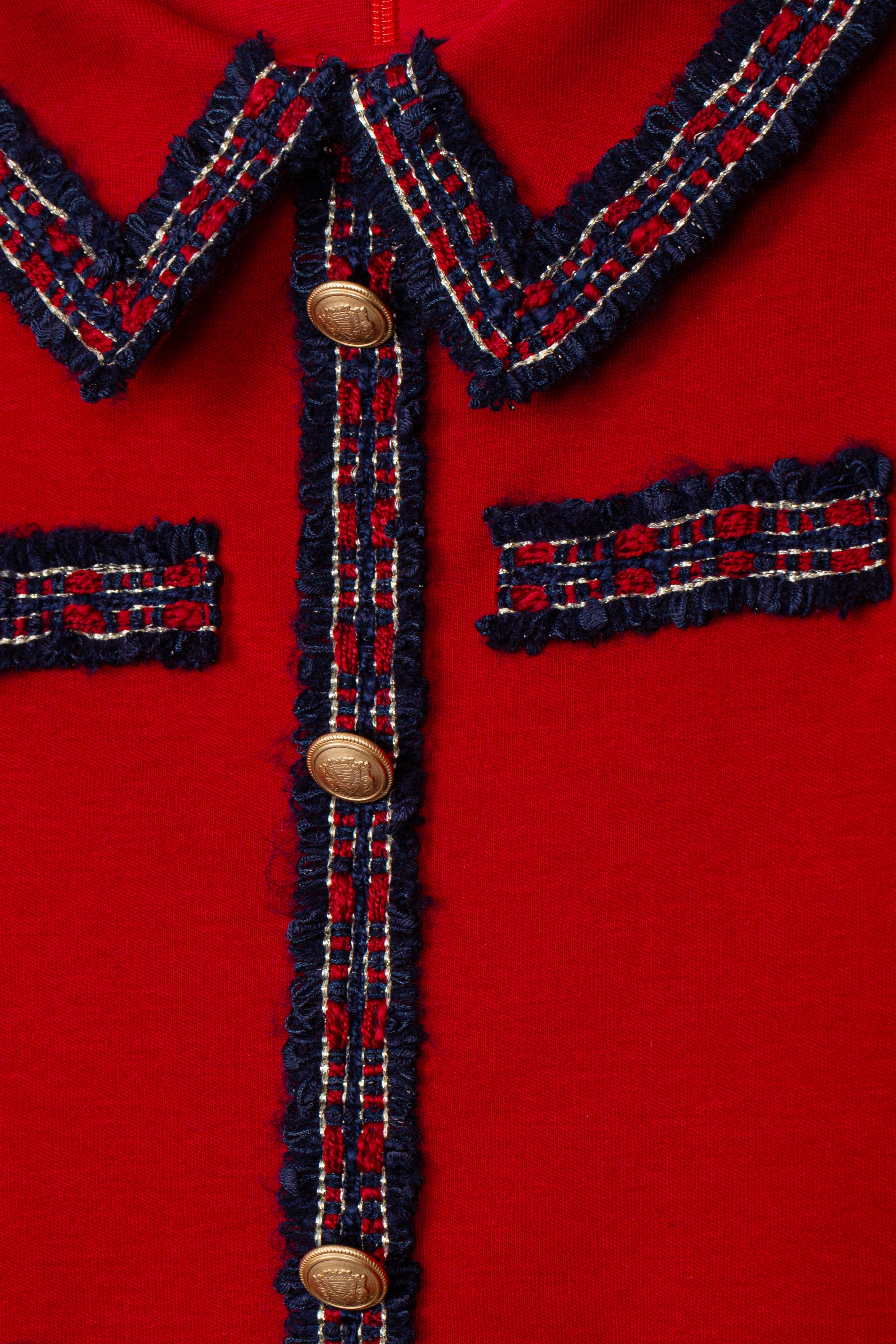 Close-up of Patachou girls red knit dress with contrast trim and buttons