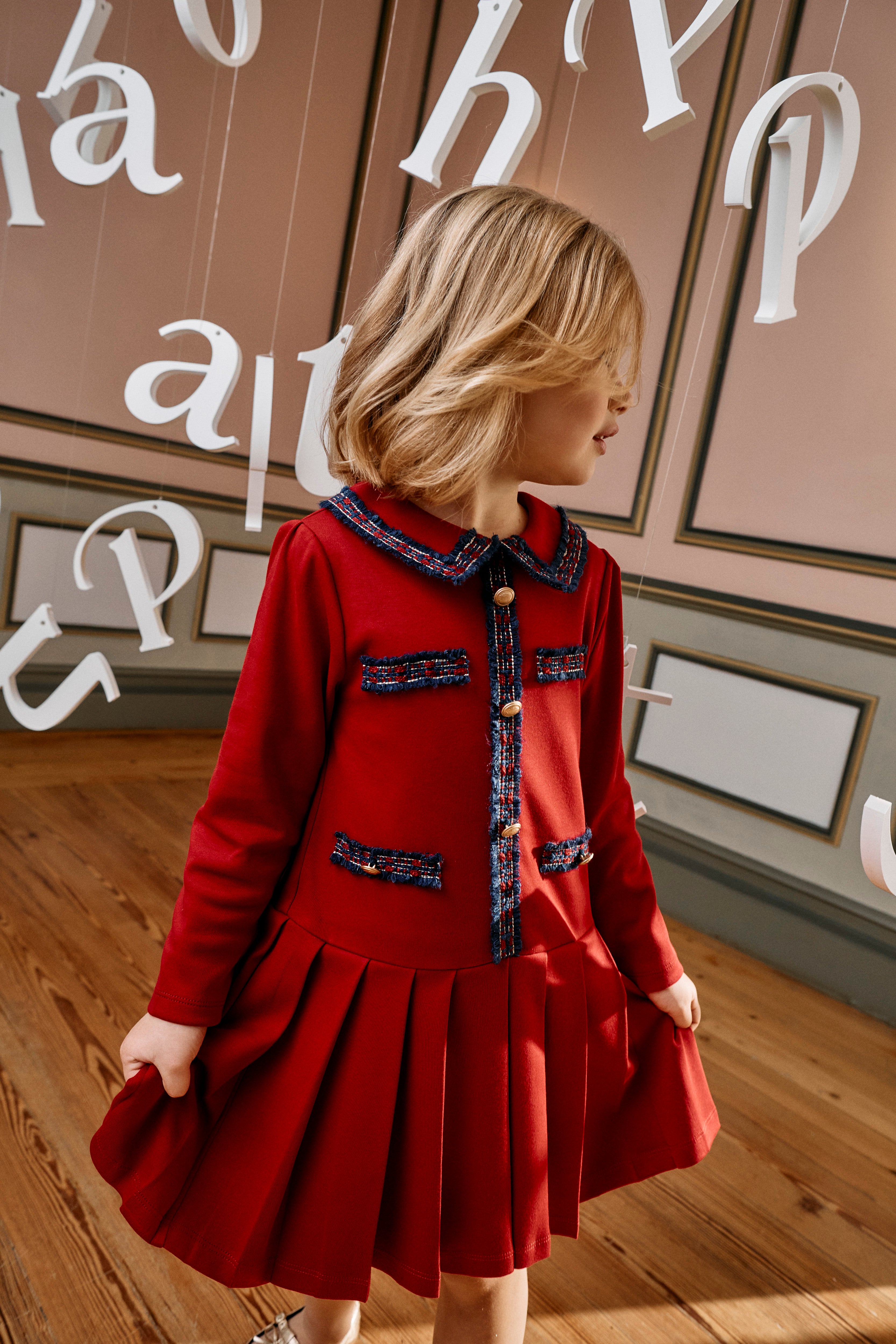 Little Girl wearing Patachou red knit Christmas occasion dress