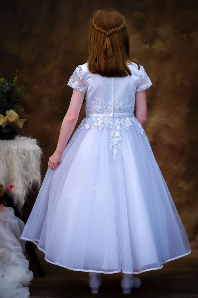 Poinsettia “Siomha” White Princess Style Communion Dress From The Back