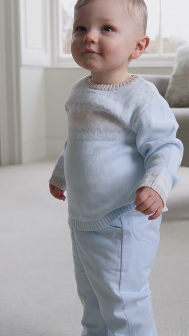 Baby boy wearing Emile et Rose Martin pale blue outfit gift set