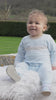 Baby boy wearing Emile et Rose Magnus pale blue knitted romper video