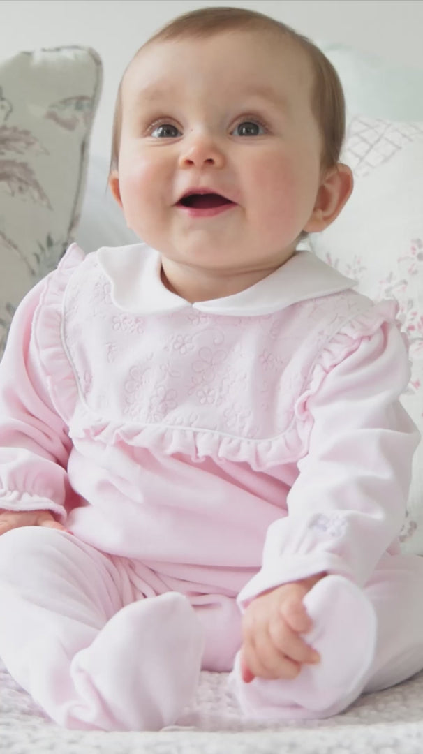 Baby girl wearing Emile et Rose Maddy pink velour babygrow video