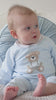 Baby boy wearing Emile et Rose Milo pale blue teddy bear occasion babygrow video