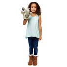 Child holding The Puppet Company grey elephant hand puppet for storytelling and imaginative play