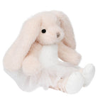The Puppet Company rabbit soft toy seated in a white ballet outfit