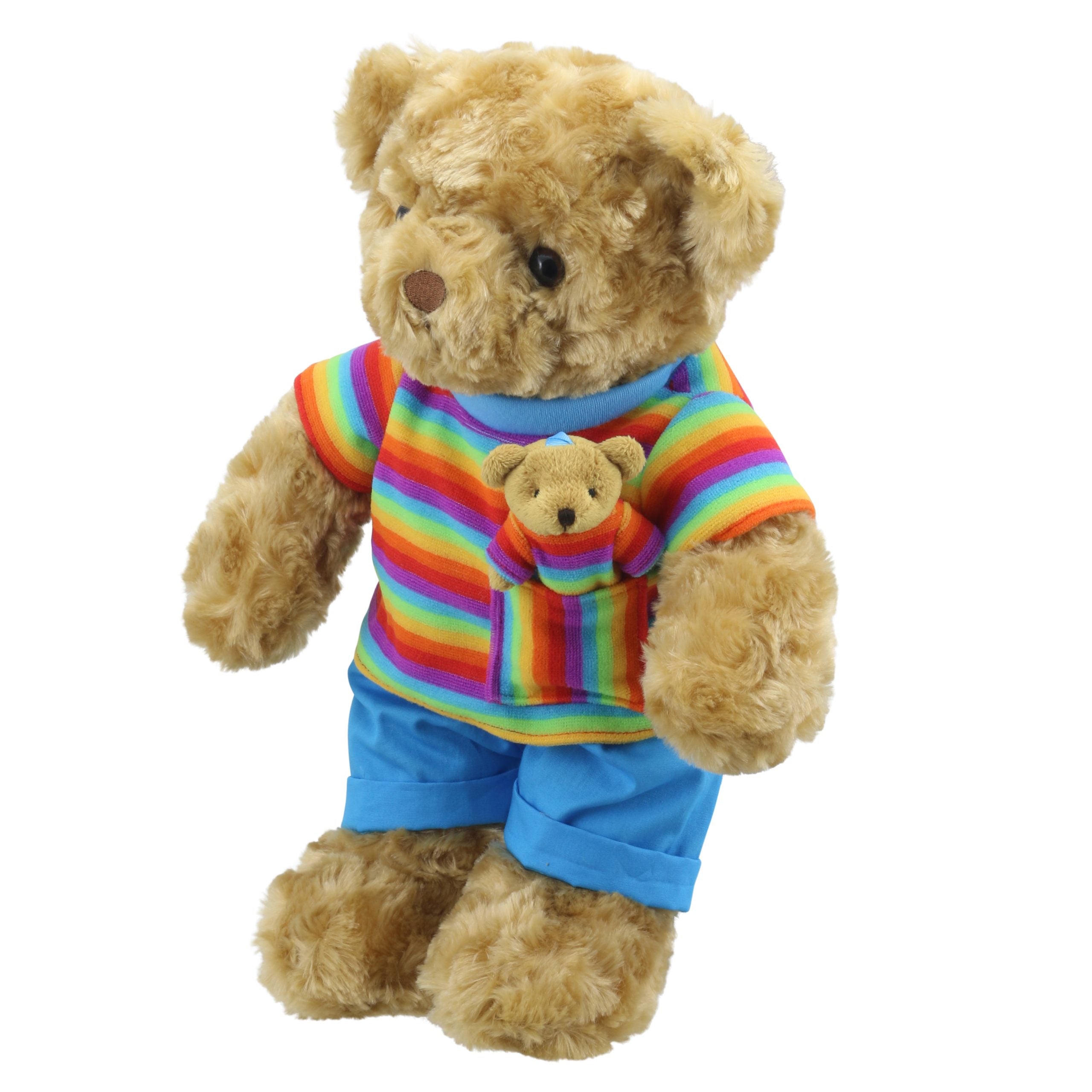 Wilberry Rainbow teddy bear wearing a striped top and blue shorts