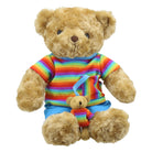 The Puppet Company Wilberry Rainbow Bear soft toy seated with miniature teddy