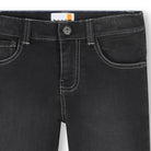 Close-up of Timberland boys black jeans showing waistband, button fastening and contrast stitching