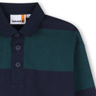 Close-up of Timberland boys rugby shirt collar and button fastening