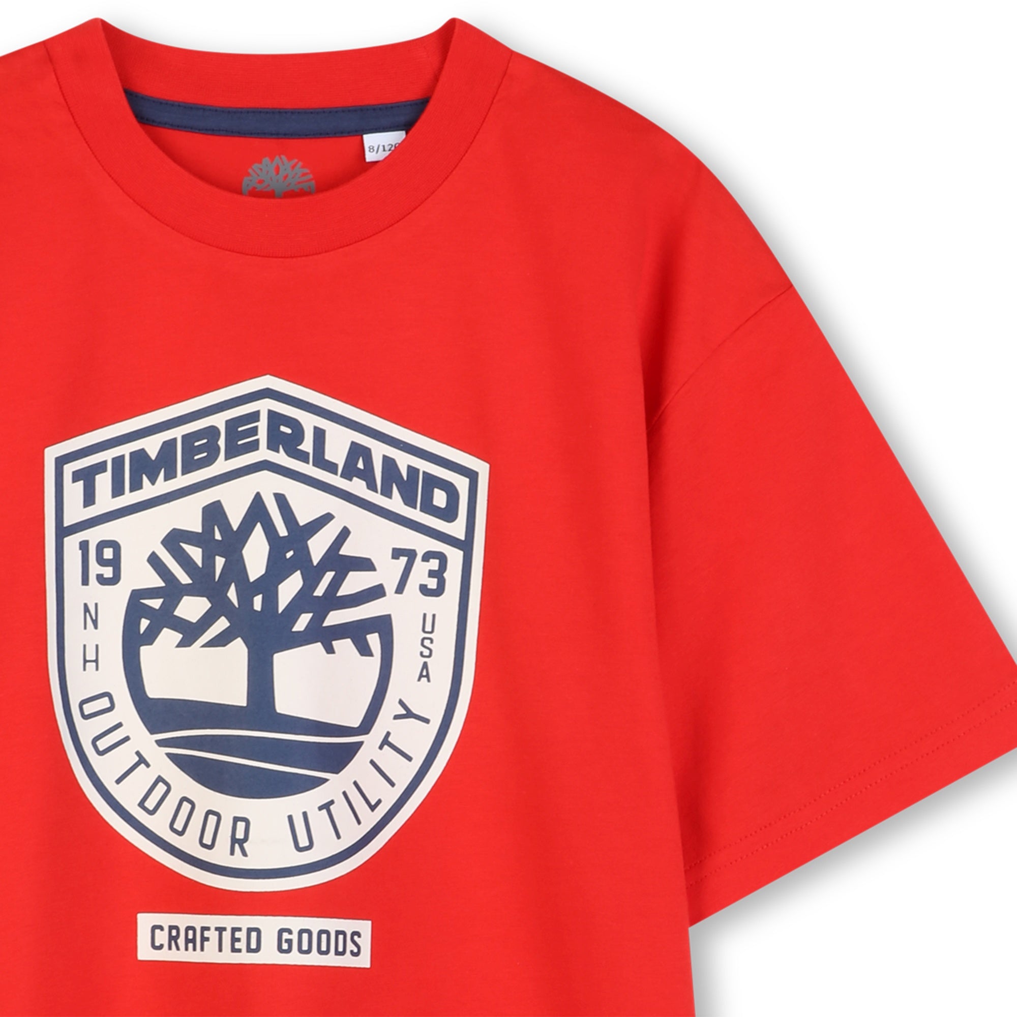     Timberland boys red logo T-shirt close-up with outdoor utility motif