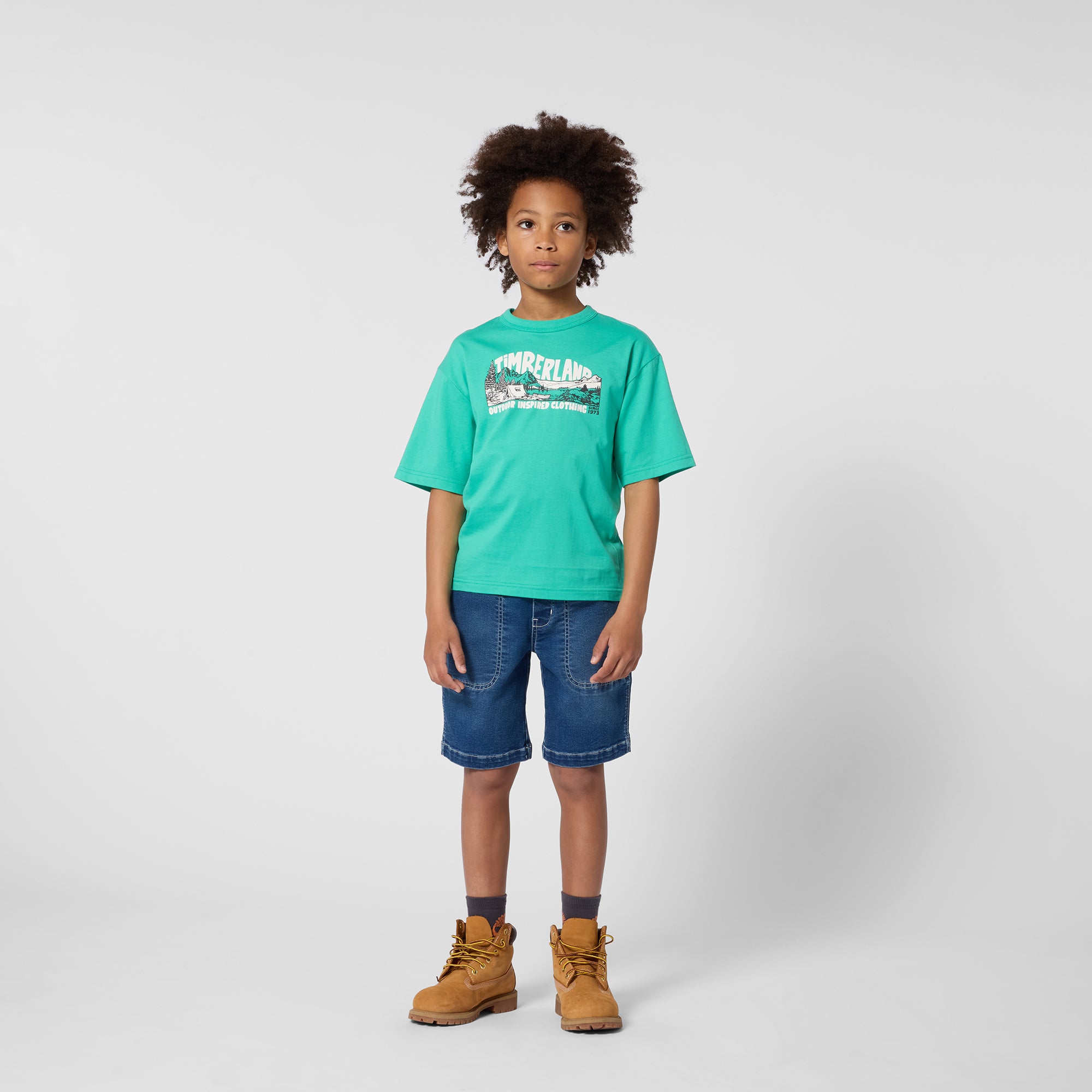  Timberland boys denim shorts styled with green Timberland T-shirt