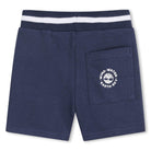     Timberland boys striped polo shirt close-up with chest pocket logo