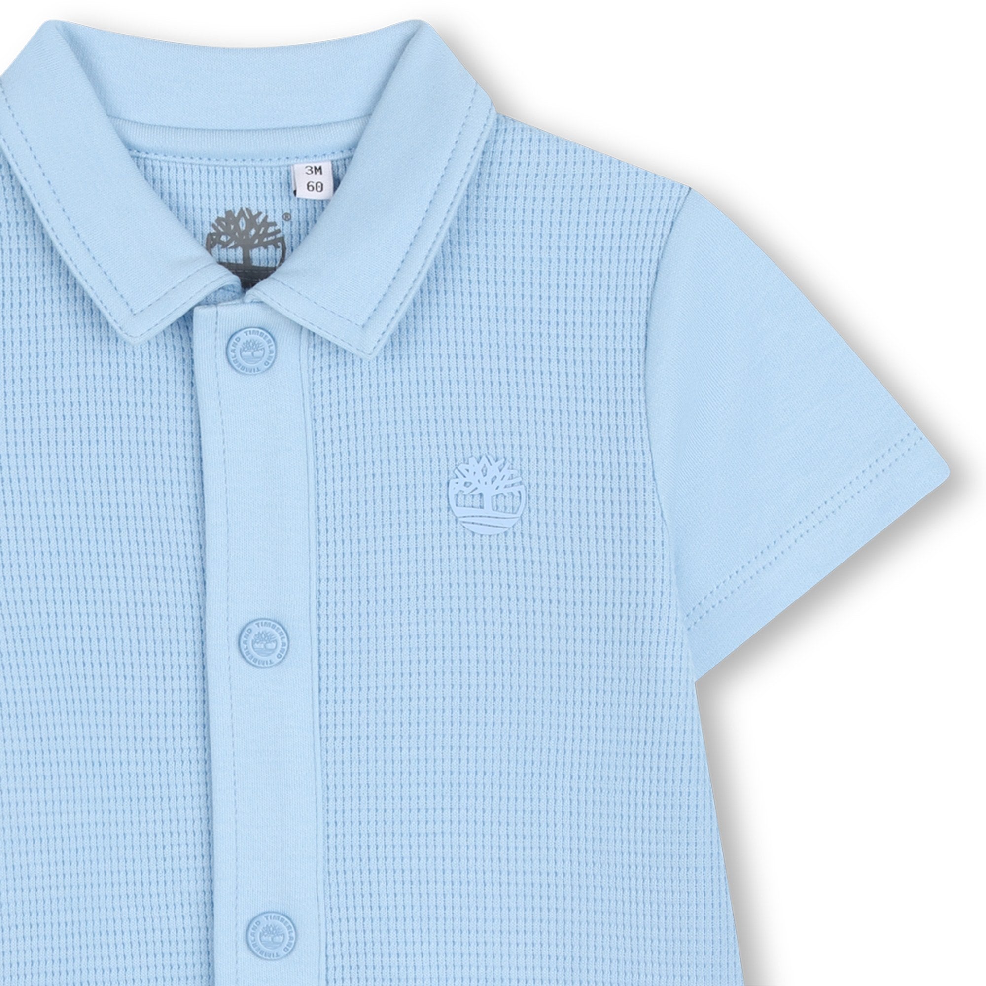     Timberland baby boys blue romper close-up with collar detail