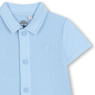     Timberland baby boys blue romper close-up with collar detail
