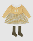 Baby girl wearing Tutto Piccolo mustard duck dress and tights set