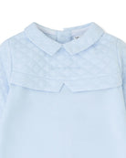 Close-up of Tutto Piccolo sky blue baby romper padded yoke and collar