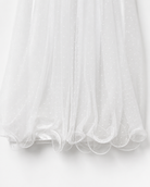    Close-up of the curled tulle hem on the Visara baby girls christening gown