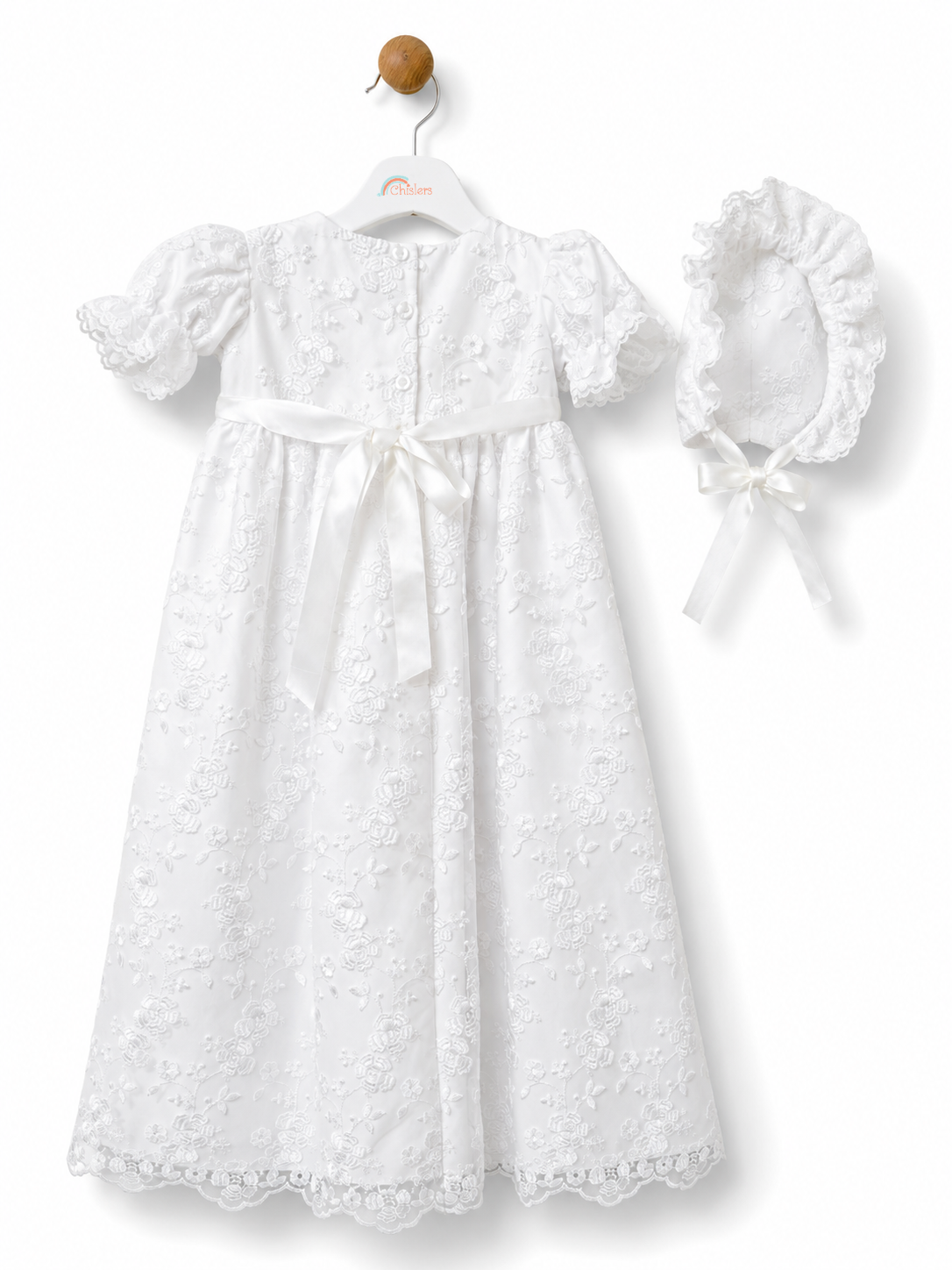 Rear view of the Visara white christening gown with satin sash bow and matching bonnet