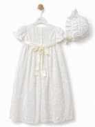 Rear view of Visara baby girls pale ivory floral christening gown with satin sash and matching bonnet