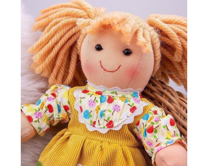 BIGJIGS_DAISY_DOLL-28CM_BRIGHTLY_ COLOURED_YELLOW DRESS_AND_HAS_A-VERY_HAIRSTYLE